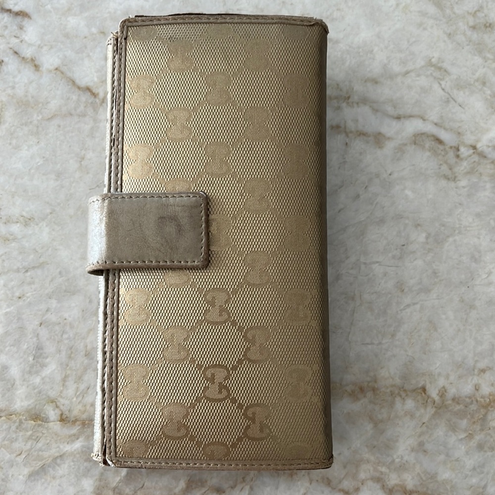 Gold Gucci wallet